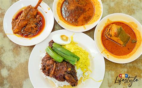  Nasi Kandar – Eine exotische Symphonie aus scharfen Aromen und cremigen Texturen!